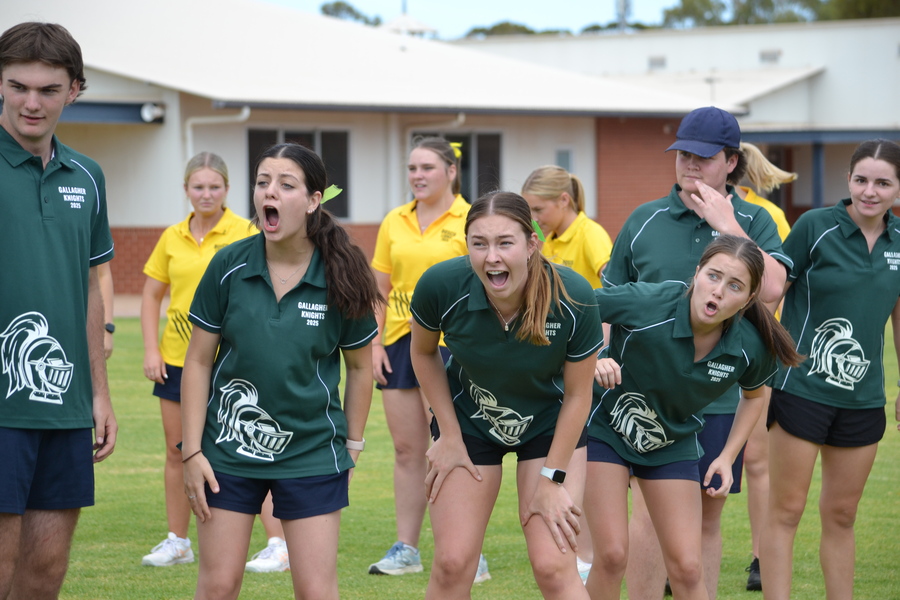 WARM UP > Team spirit was high as students participated in the pre-Sports Day hype-up during WRAP!