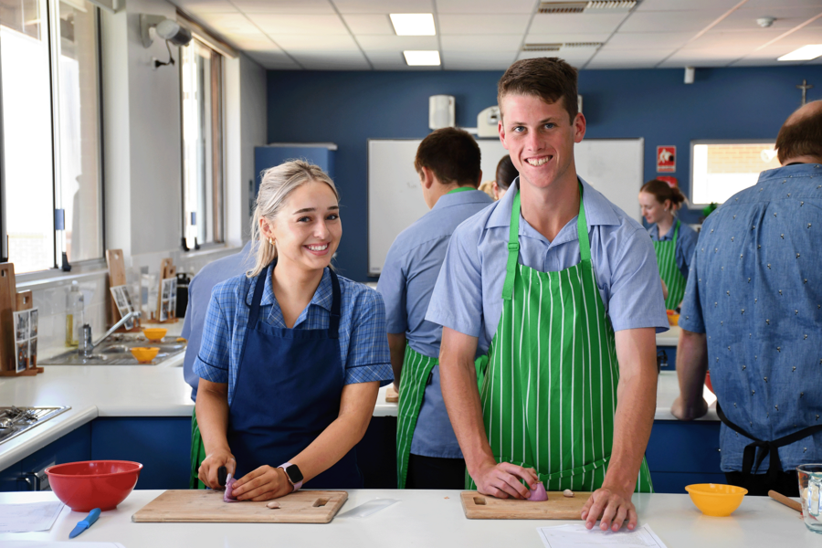 FOOD + HOSPITALITY > Year 12s practicing a range of skills while making Pad Thai.