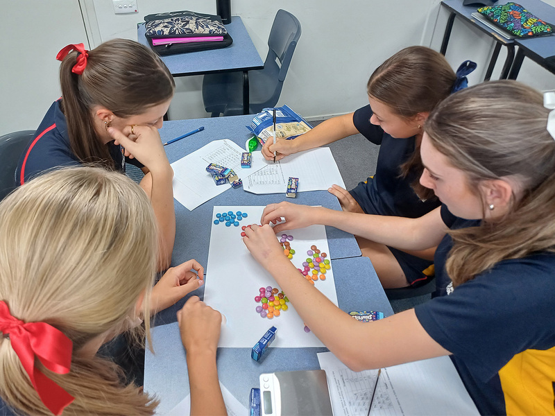 MATHS > Year 10 students have been making their learning in statistical analysis fun using fun-size packets of Smarties. They have been looking at the number of Smarties and colour distribution in each mini box. 