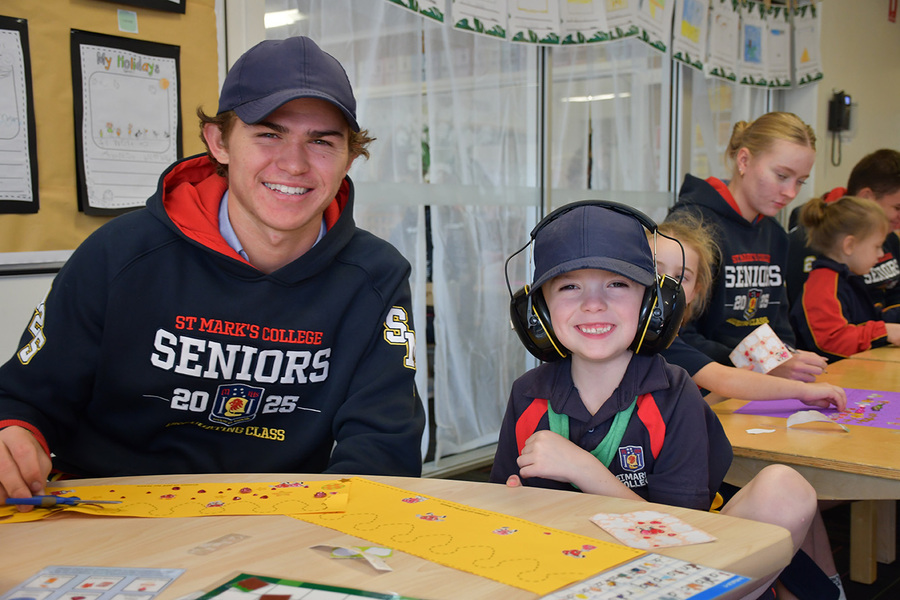 BUDDIES > Reception and Year 12 Buddies enjoyed being together and making Easter crowns.