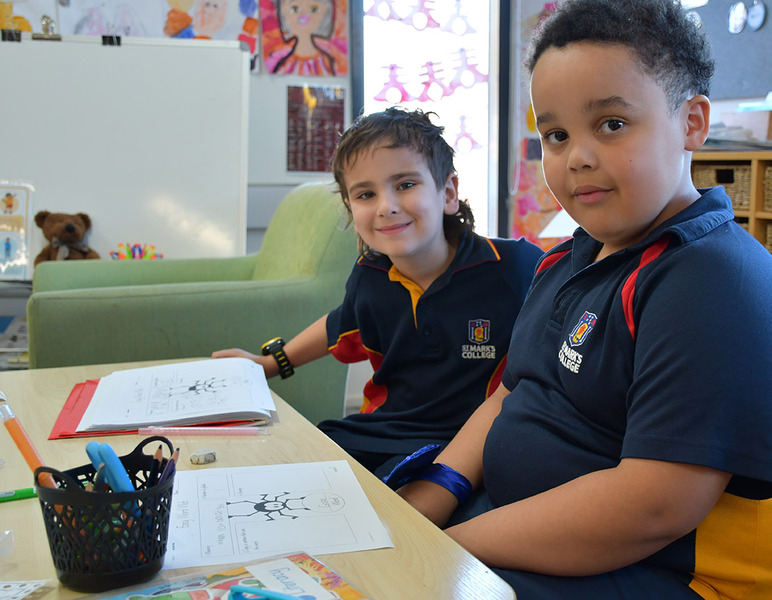 TERM 2 > Year 1 students working in the classroom.