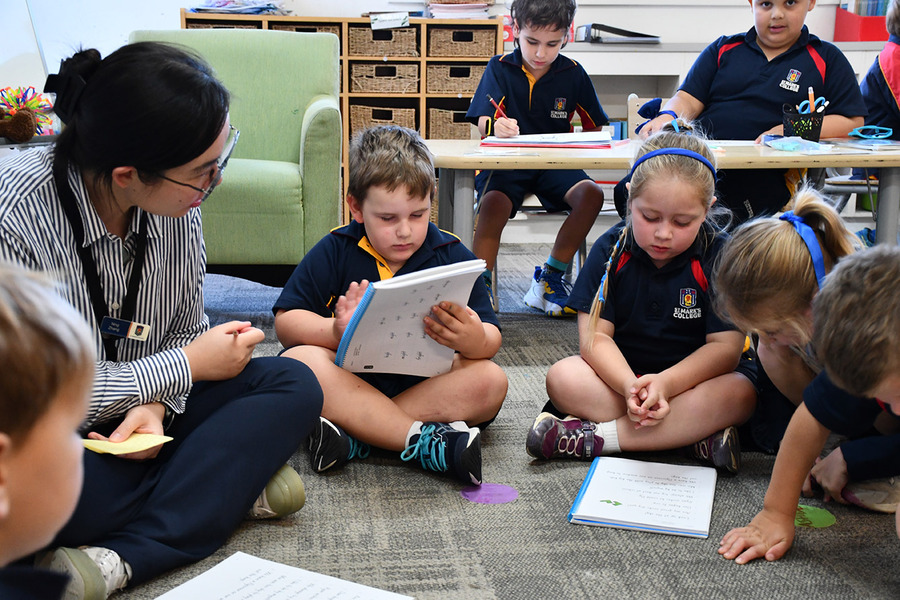 TERM 2 > Year 1 students working in the classroom.