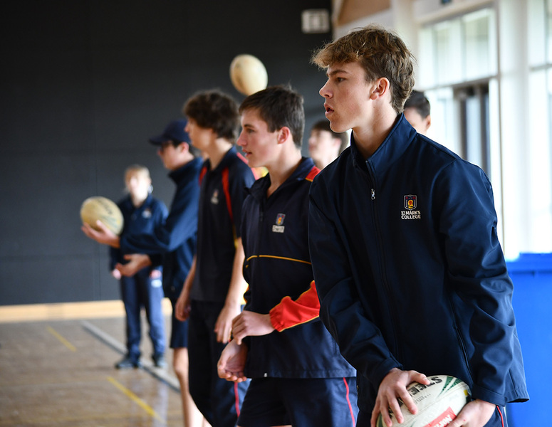 PE > Year 10 students have been developing skills such as passing, catching, roll ball and tap in Touch Football.