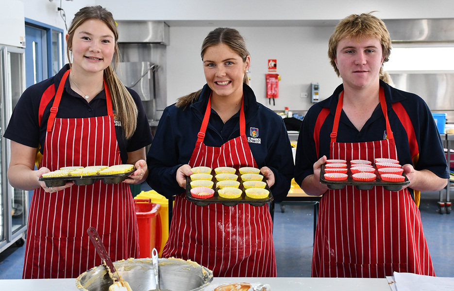 COOKING > Year 11 students baked cupcakes to raise money for the Philippines Immersion.