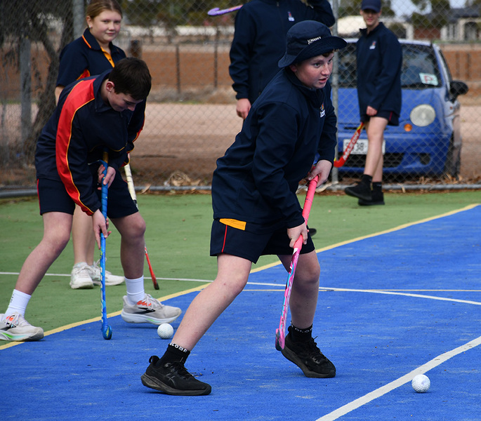 PE > Year 8 students have been developing skills such as dribbling, passing and tackling in Hockey.