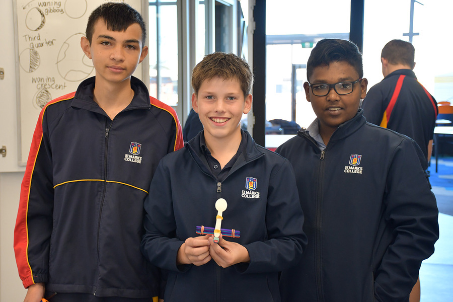 SCIENCE > Year 8 students made their own catapault, using it to launch an eraser in an effort to record energy.