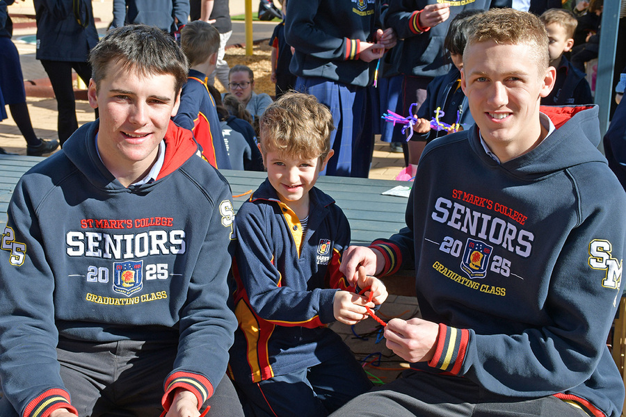 BUDDIES > Reception and Year 12 Buddies worked together to make serpents
