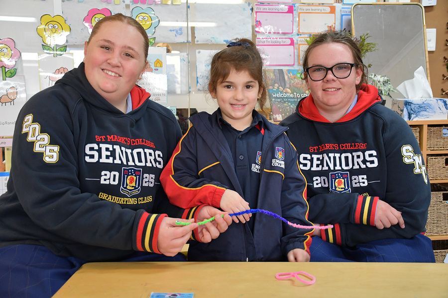 BUDDIES > Reception and Year 12 Buddies worked together to make serpents