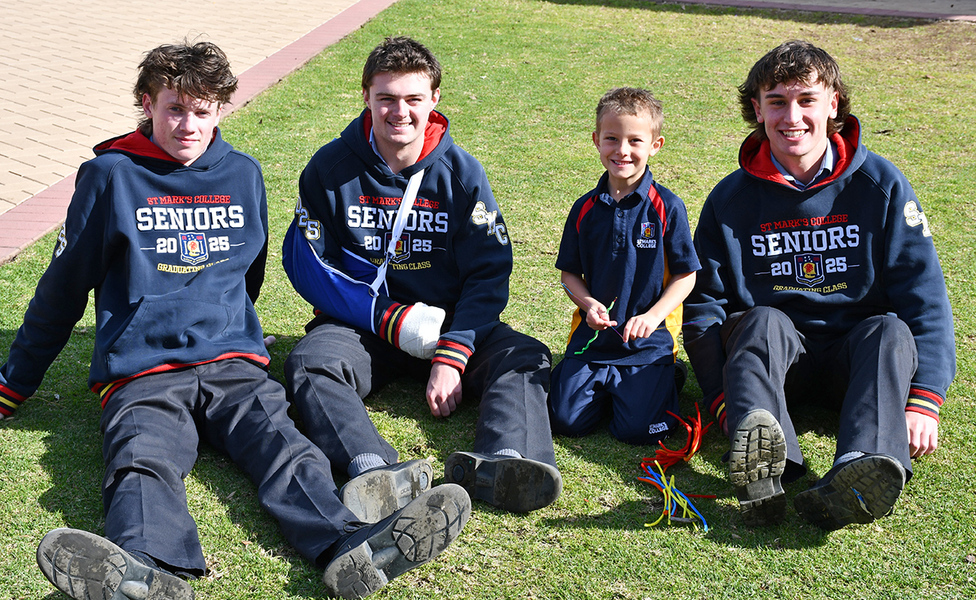 BUDDIES > Reception and Year 12 Buddies worked together to make serpents